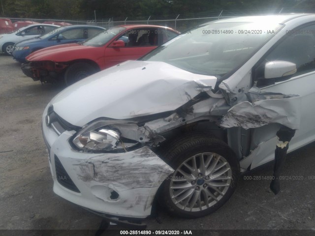 Photo 5 VIN: 1FAHP3M2XCL214868 - FORD FOCUS 