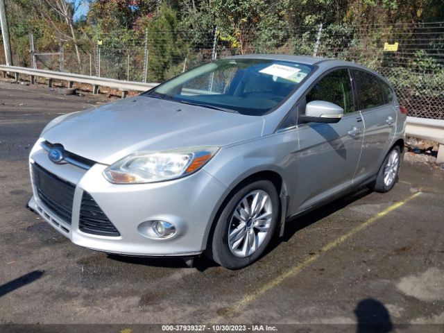 Photo 1 VIN: 1FAHP3M2XCL247241 - FORD FOCUS 