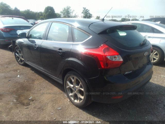 Photo 2 VIN: 1FAHP3M2XCL288341 - FORD FOCUS 