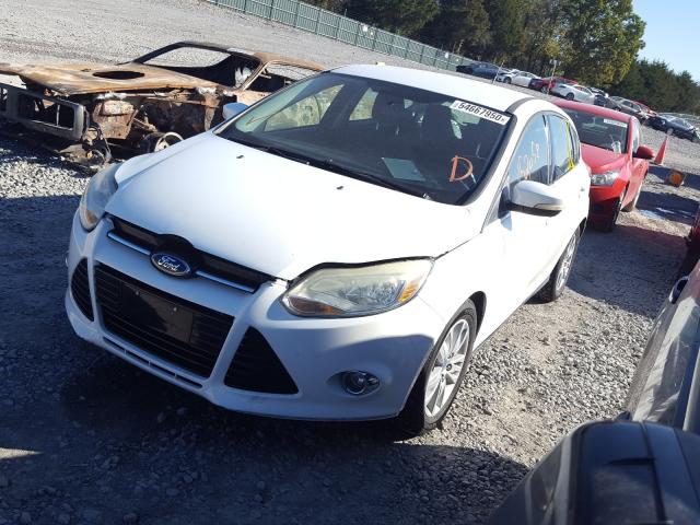 Photo 1 VIN: 1FAHP3M2XCL325386 - FORD FOCUS SEL 