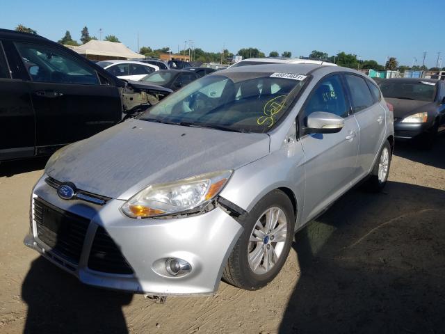 Photo 1 VIN: 1FAHP3M2XCL325422 - FORD FOCUS SEL 