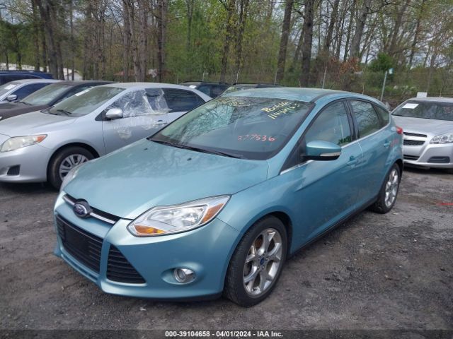 Photo 1 VIN: 1FAHP3M2XCL377536 - FORD FOCUS 