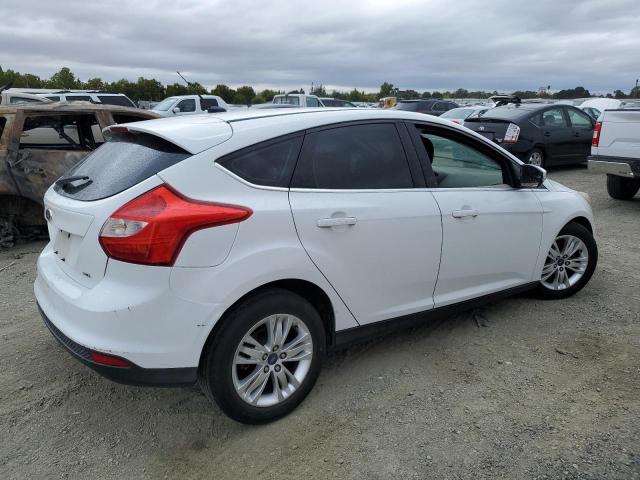 Photo 2 VIN: 1FAHP3M2XCL469701 - FORD FOCUS SEL 