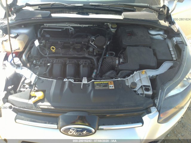 Photo 9 VIN: 1FAHP3N20CL230446 - FORD FOCUS 