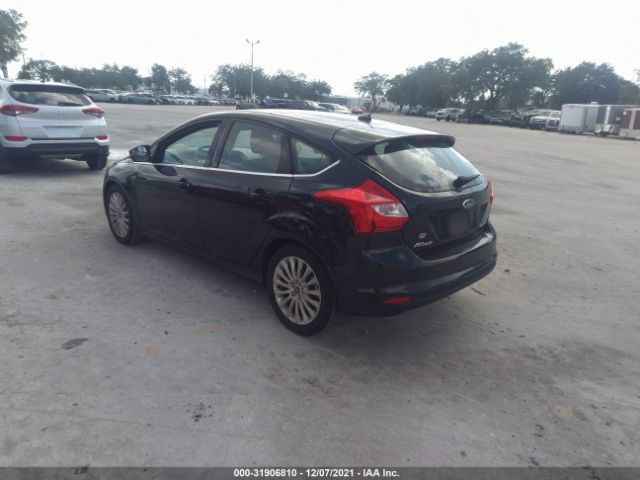 Photo 2 VIN: 1FAHP3N20CL293109 - FORD FOCUS 