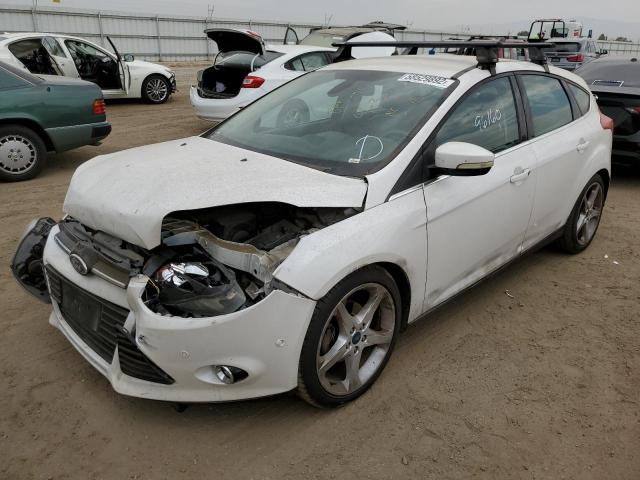 Photo 1 VIN: 1FAHP3N20CL337237 - FORD FOCUS TITA 