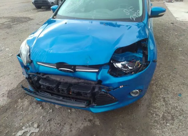 Photo 5 VIN: 1FAHP3N21CL427738 - FORD FOCUS 