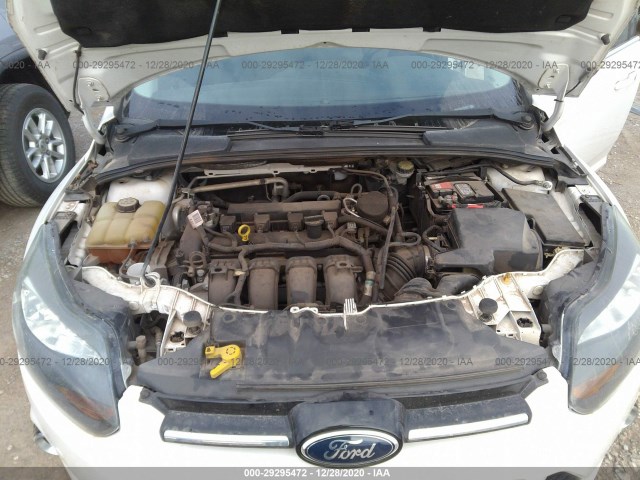 Photo 9 VIN: 1FAHP3N21CL428811 - FORD FOCUS 