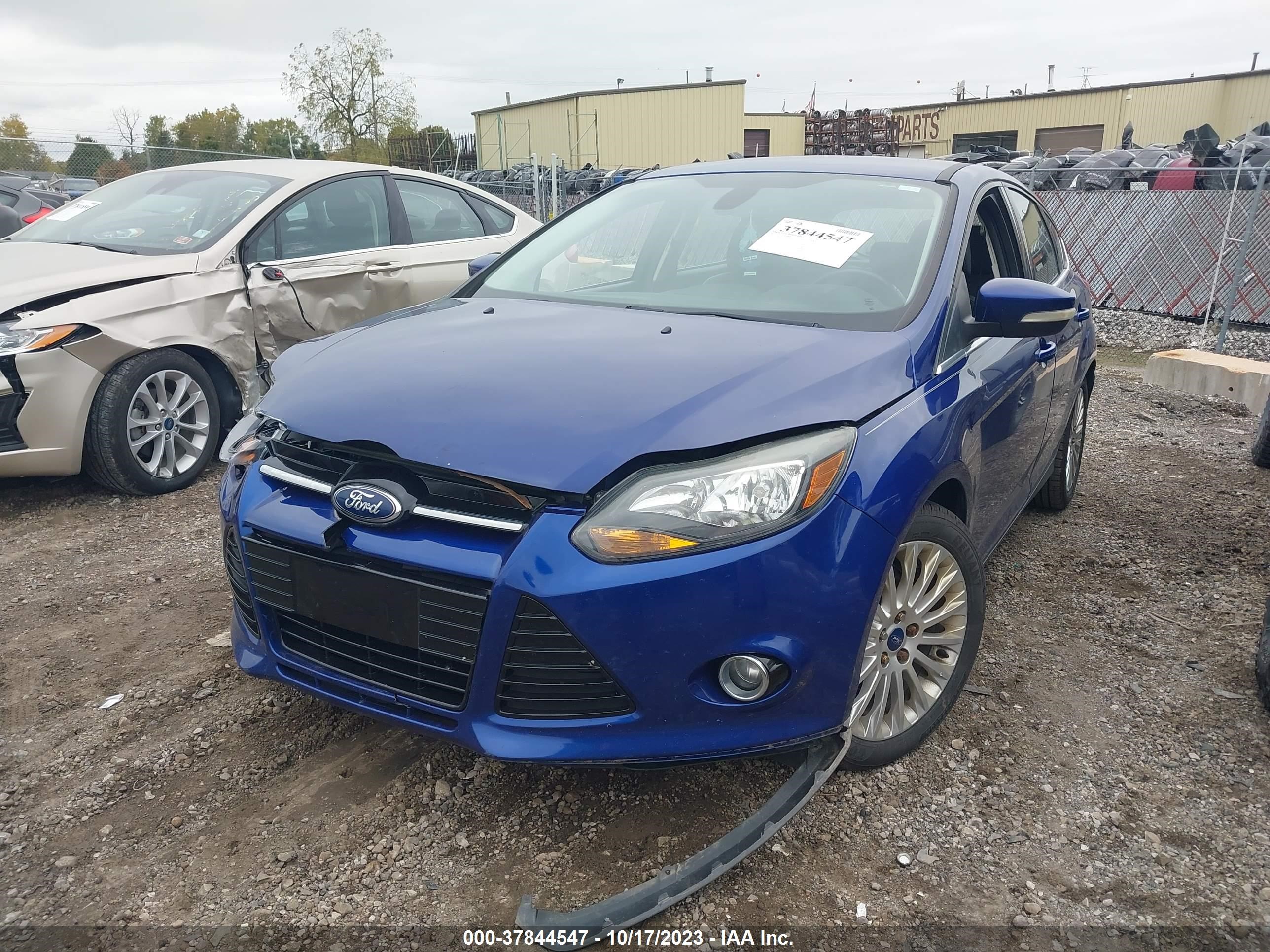 Photo 1 VIN: 1FAHP3N21CL479922 - FORD FOCUS 