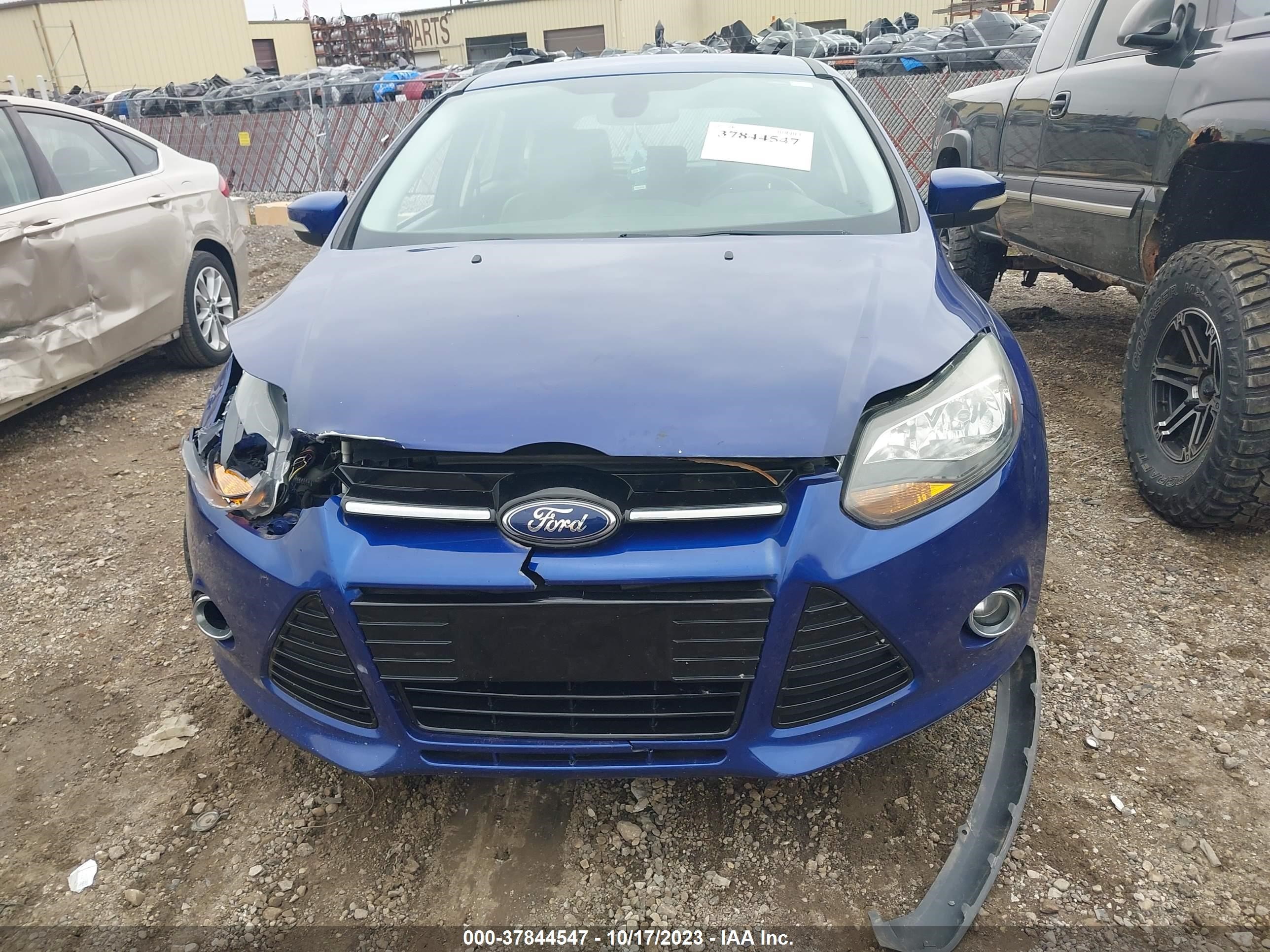 Photo 11 VIN: 1FAHP3N21CL479922 - FORD FOCUS 