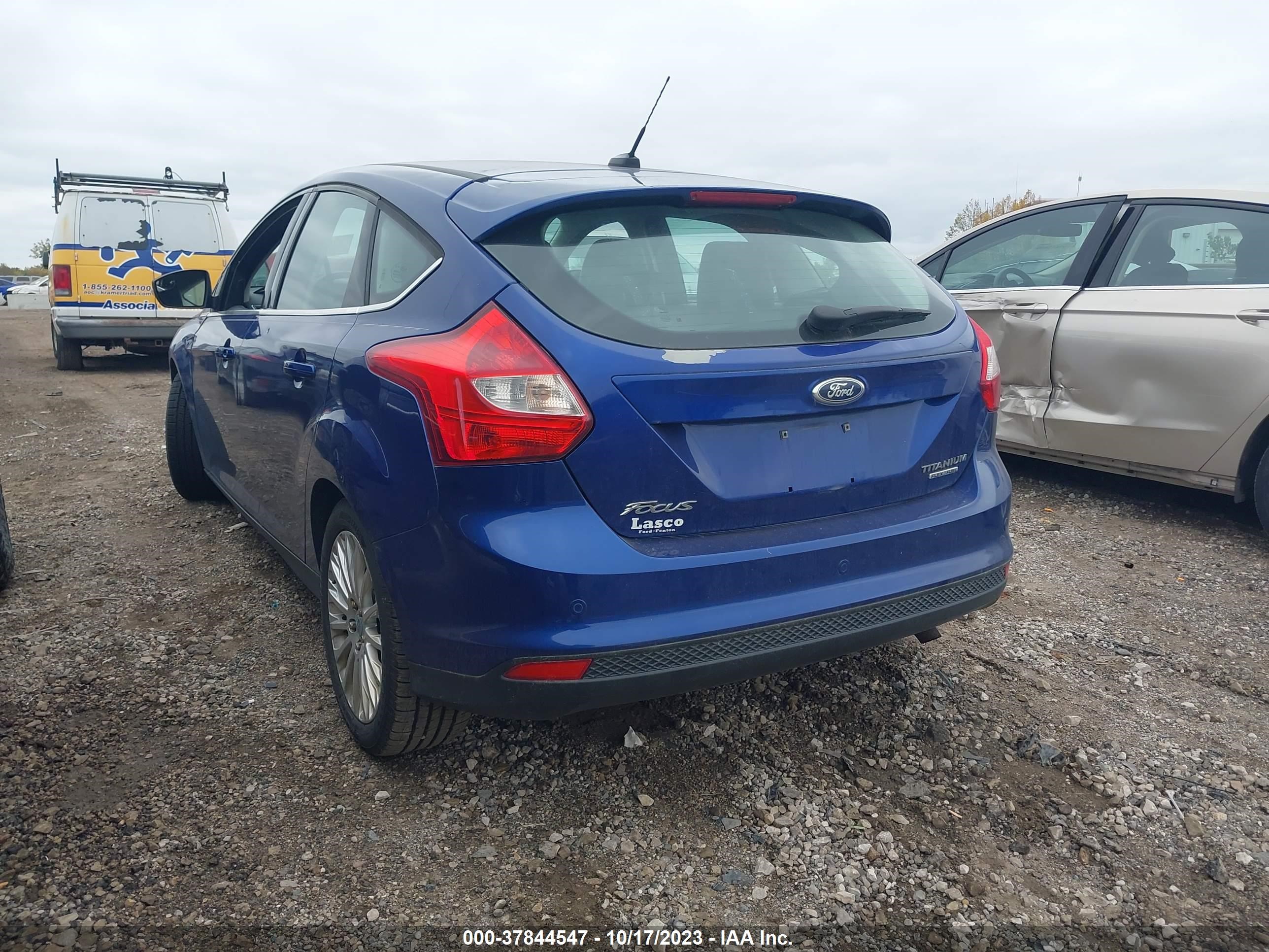 Photo 2 VIN: 1FAHP3N21CL479922 - FORD FOCUS 