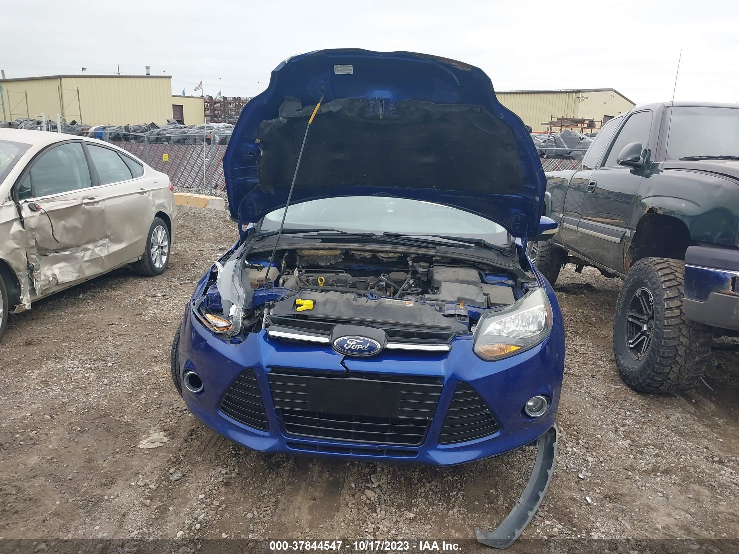 Photo 5 VIN: 1FAHP3N21CL479922 - FORD FOCUS 