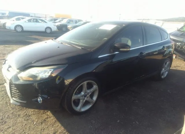 Photo 1 VIN: 1FAHP3N22CL328040 - FORD FOCUS 