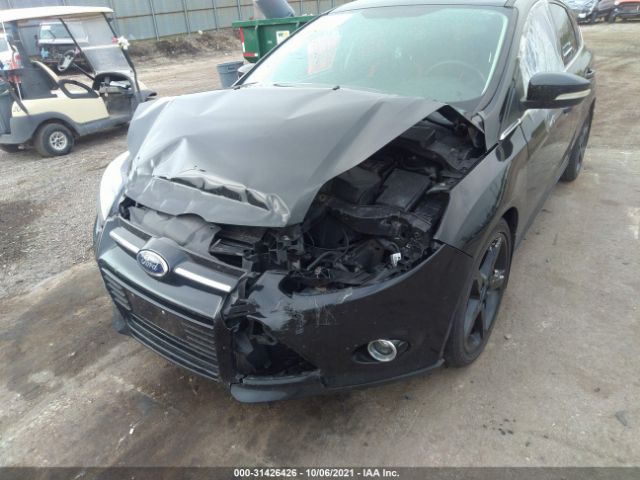 Photo 5 VIN: 1FAHP3N22CL345923 - FORD FOCUS 