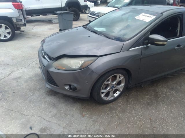 Photo 1 VIN: 1FAHP3N23CL303809 - FORD FOCUS 