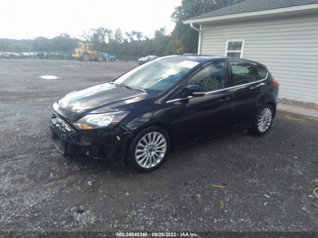 Photo 1 VIN: 1FAHP3N23CL474656 - FORD FOCUS 