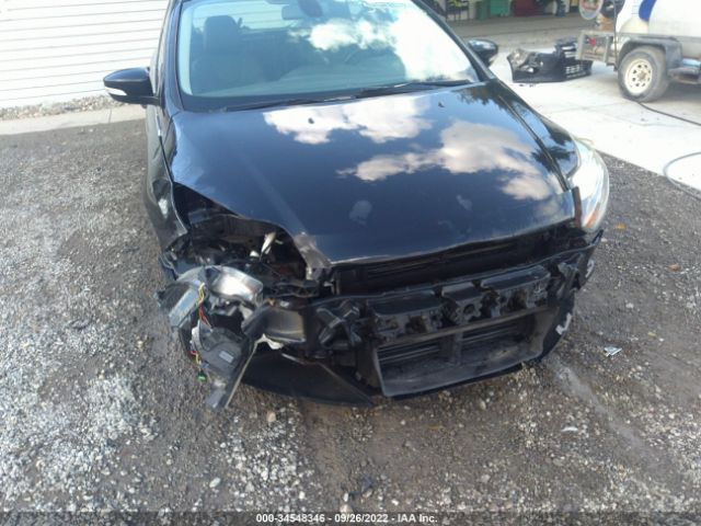 Photo 5 VIN: 1FAHP3N23CL474656 - FORD FOCUS 