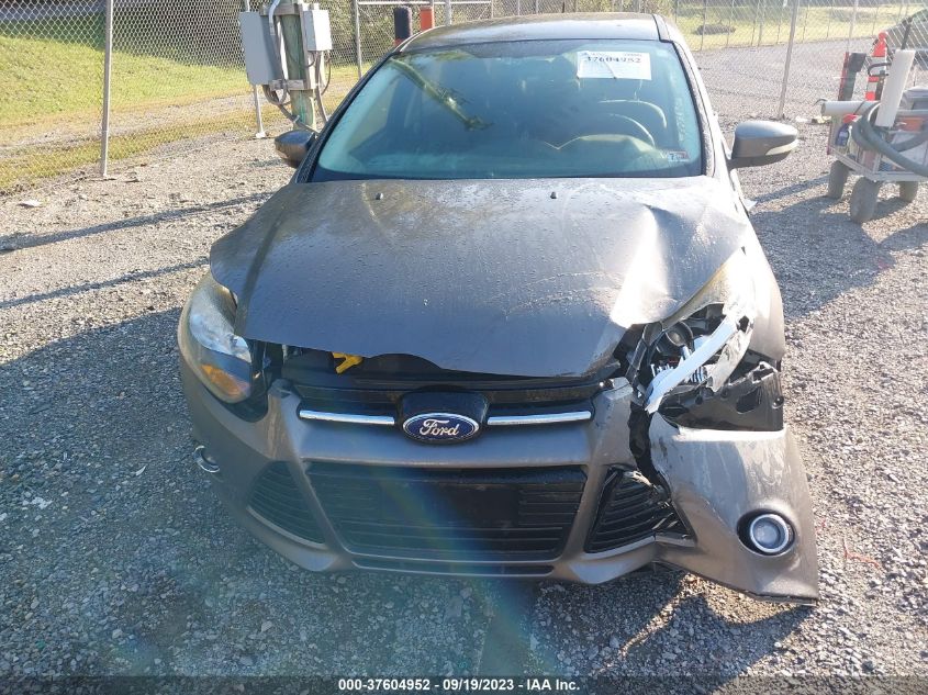 Photo 11 VIN: 1FAHP3N24CL225413 - FORD FOCUS 