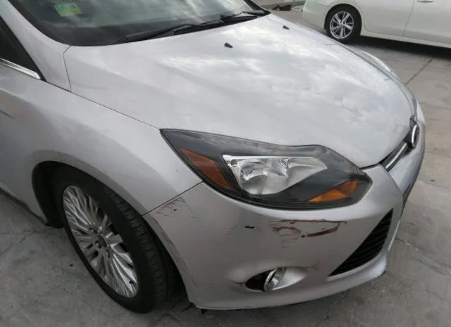 Photo 5 VIN: 1FAHP3N24CL314821 - FORD FOCUS 