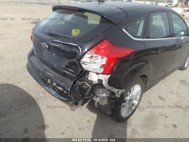 Photo 5 VIN: 1FAHP3N24CL333885 - FORD FOCUS 