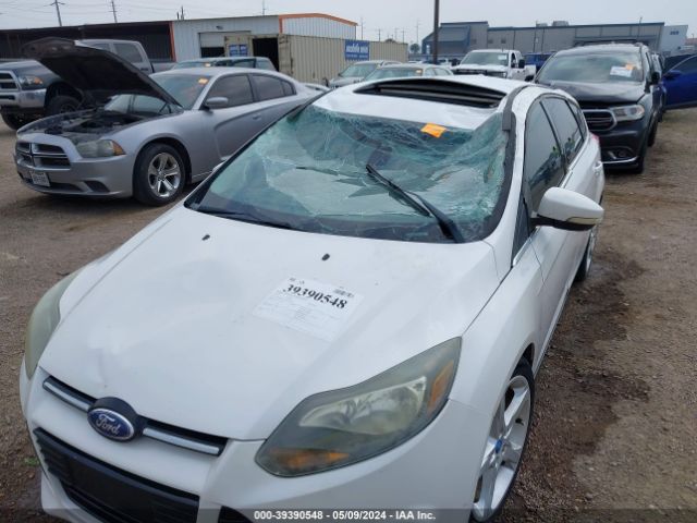 Photo 5 VIN: 1FAHP3N25CL329604 - FORD FOCUS 