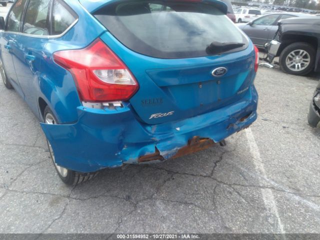 Photo 5 VIN: 1FAHP3N26CL242794 - FORD FOCUS 