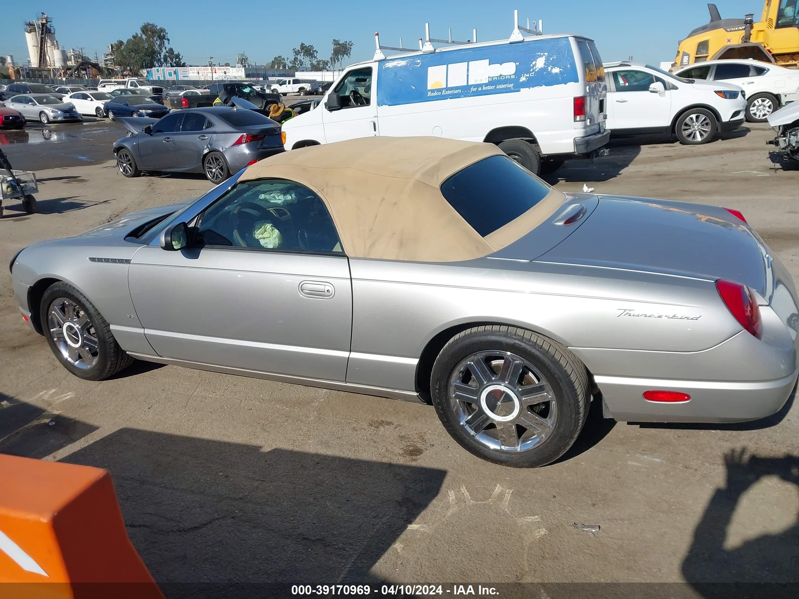 Photo 13 VIN: 1FAHP60AX4Y100324 - FORD THUNDERBIRD 