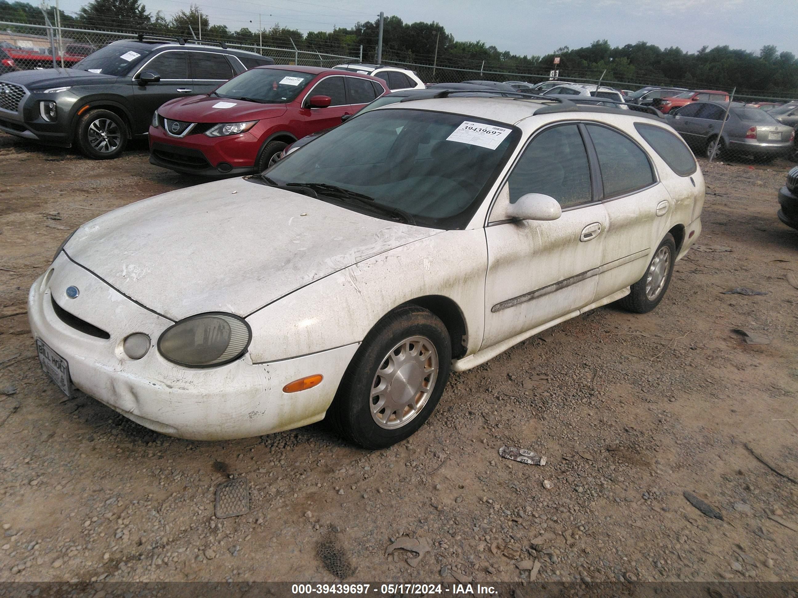 Photo 1 VIN: 1FALP58S6TA109093 - FORD TAURUS 