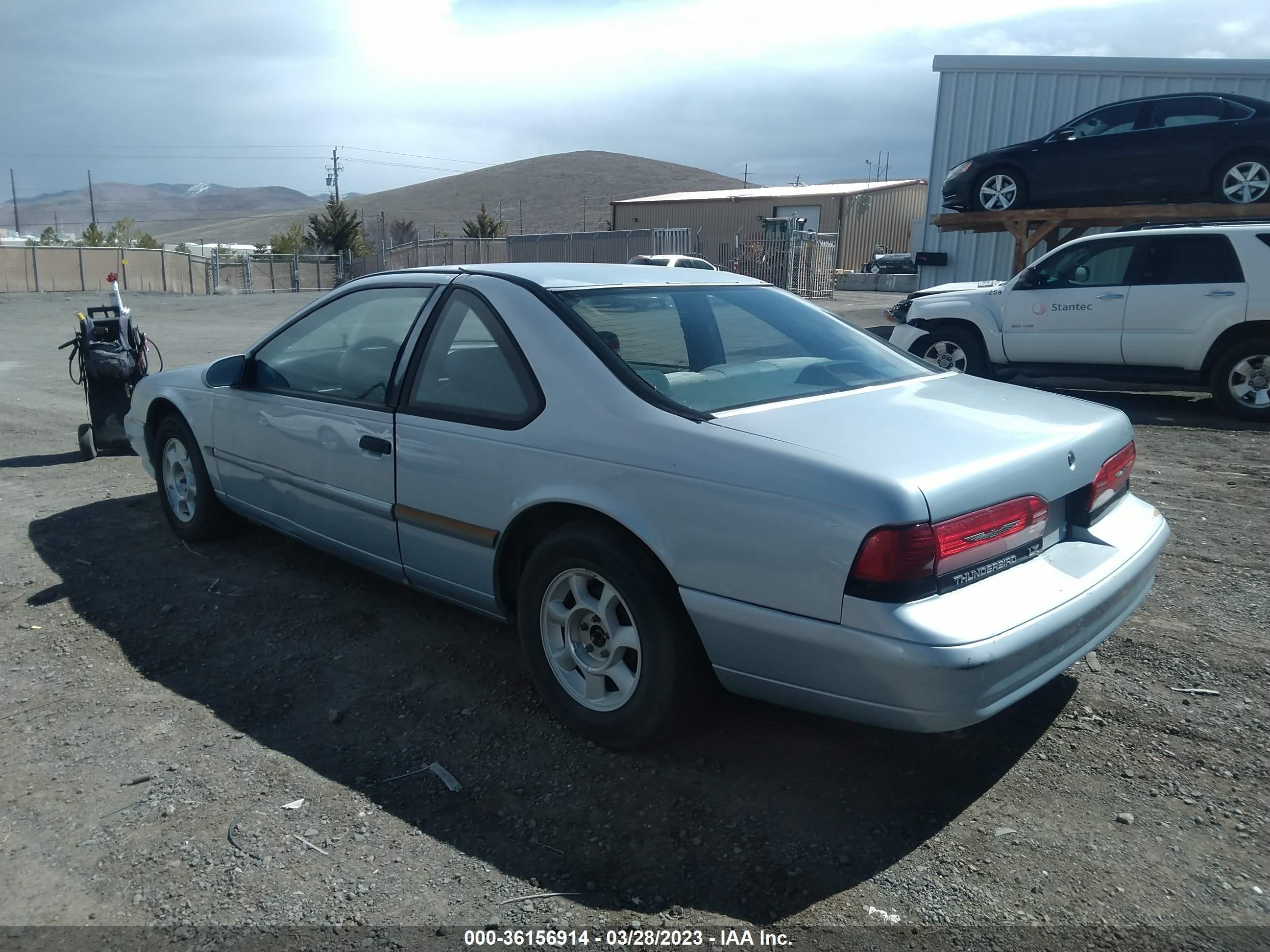 Photo 2 VIN: 1FAPP6246PH105818 - FORD THUNDERBIRD 