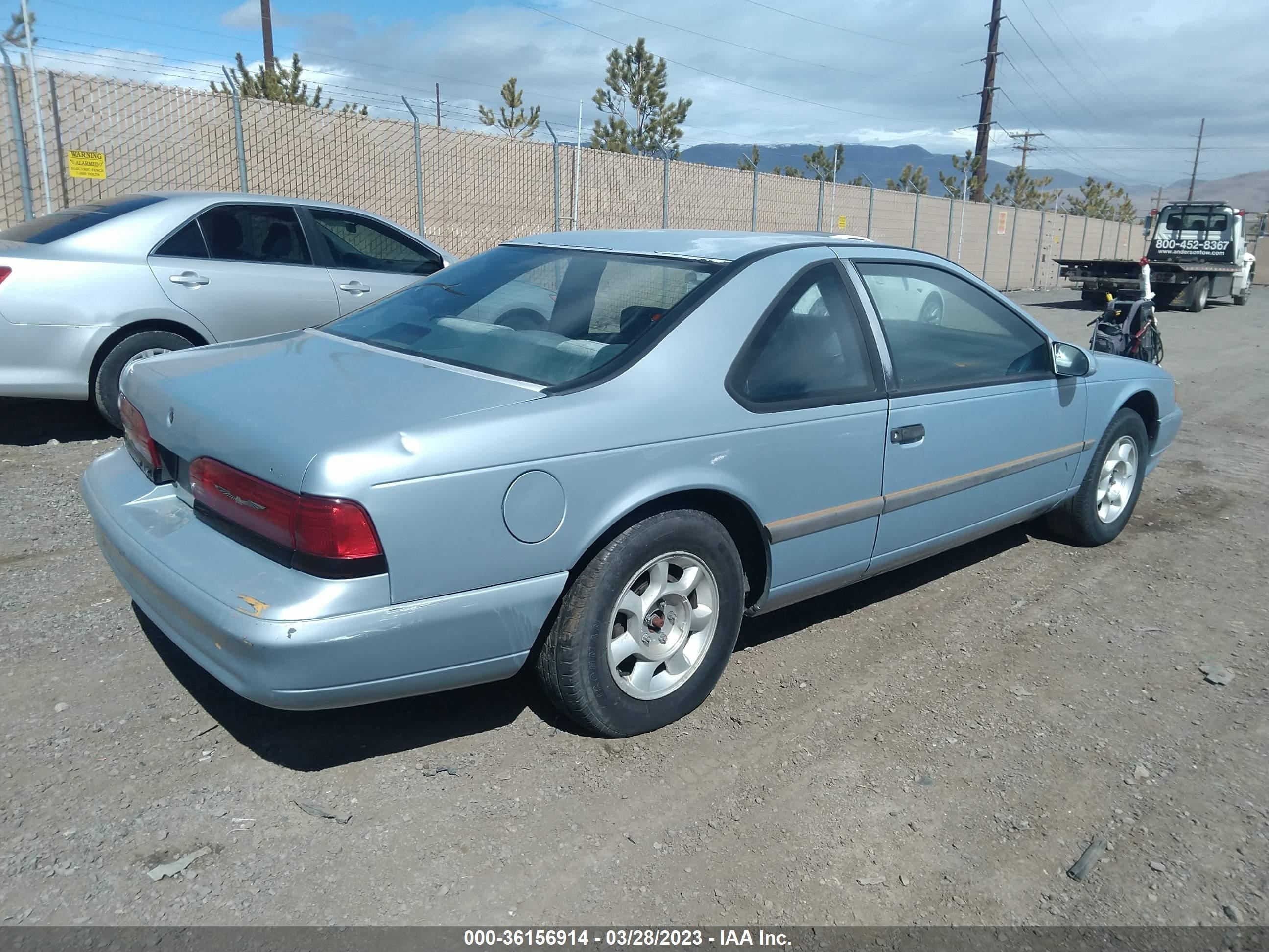 Photo 3 VIN: 1FAPP6246PH105818 - FORD THUNDERBIRD 