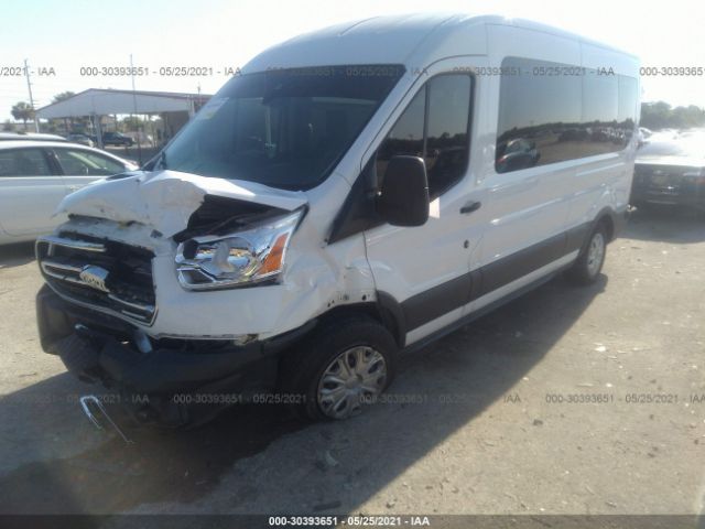 Photo 1 VIN: 1FBAX2CMXKKA06054 - FORD TRANSIT PASSENGER WAGON 