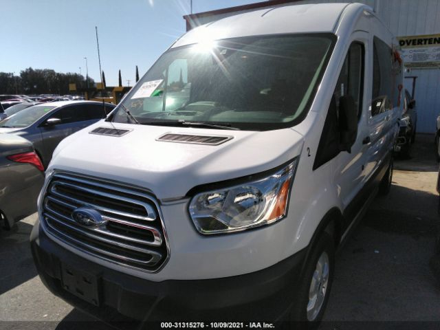 Photo 1 VIN: 1FBAX2CMXKKA95561 - FORD TRANSIT PASSENGER WAGON 