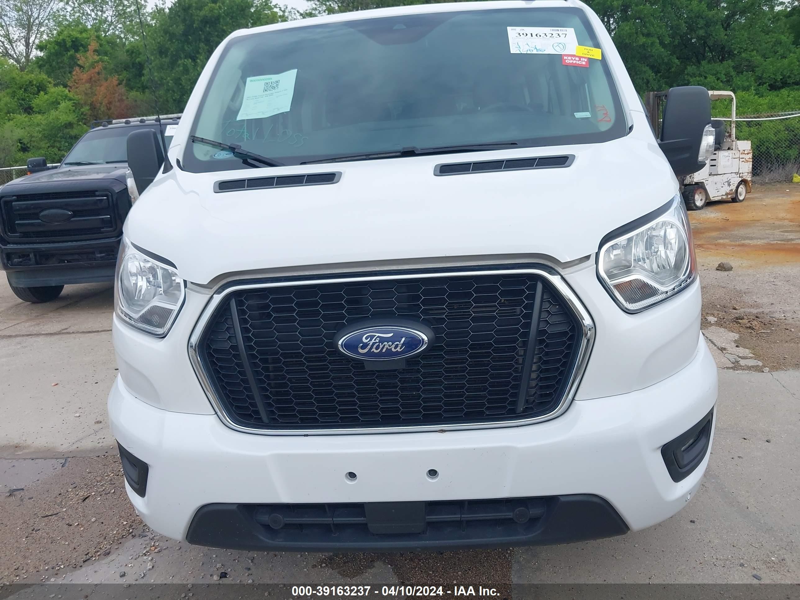 Photo 11 VIN: 1FBAX2Y82MKA31187 - FORD NULL 