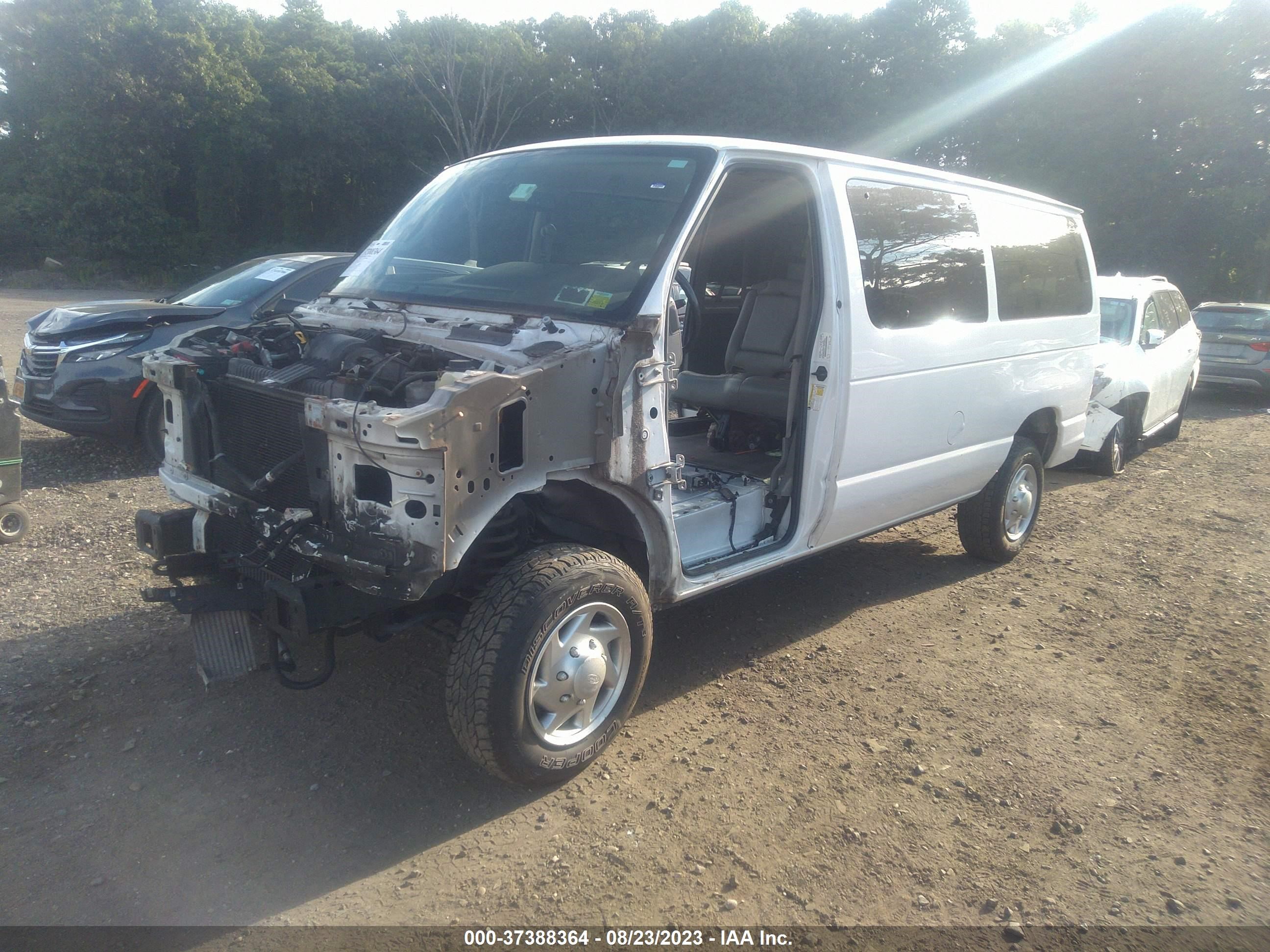 Photo 1 VIN: 1FBNE3BL8EDA32344 - FORD ECONOLINE 