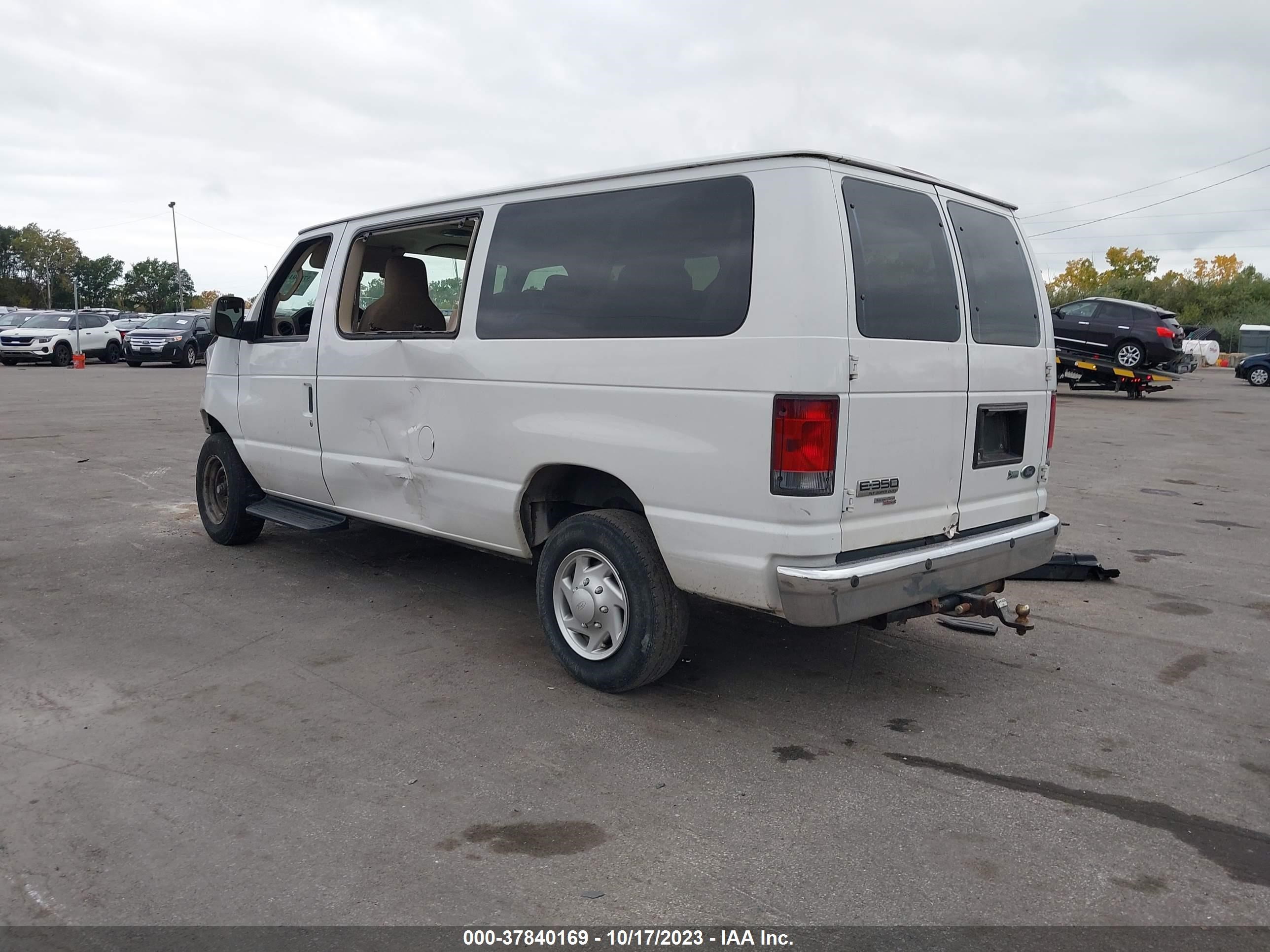 Photo 2 VIN: 1FBNE3BL9DDA65531 - FORD ECONOLINE WAGON 