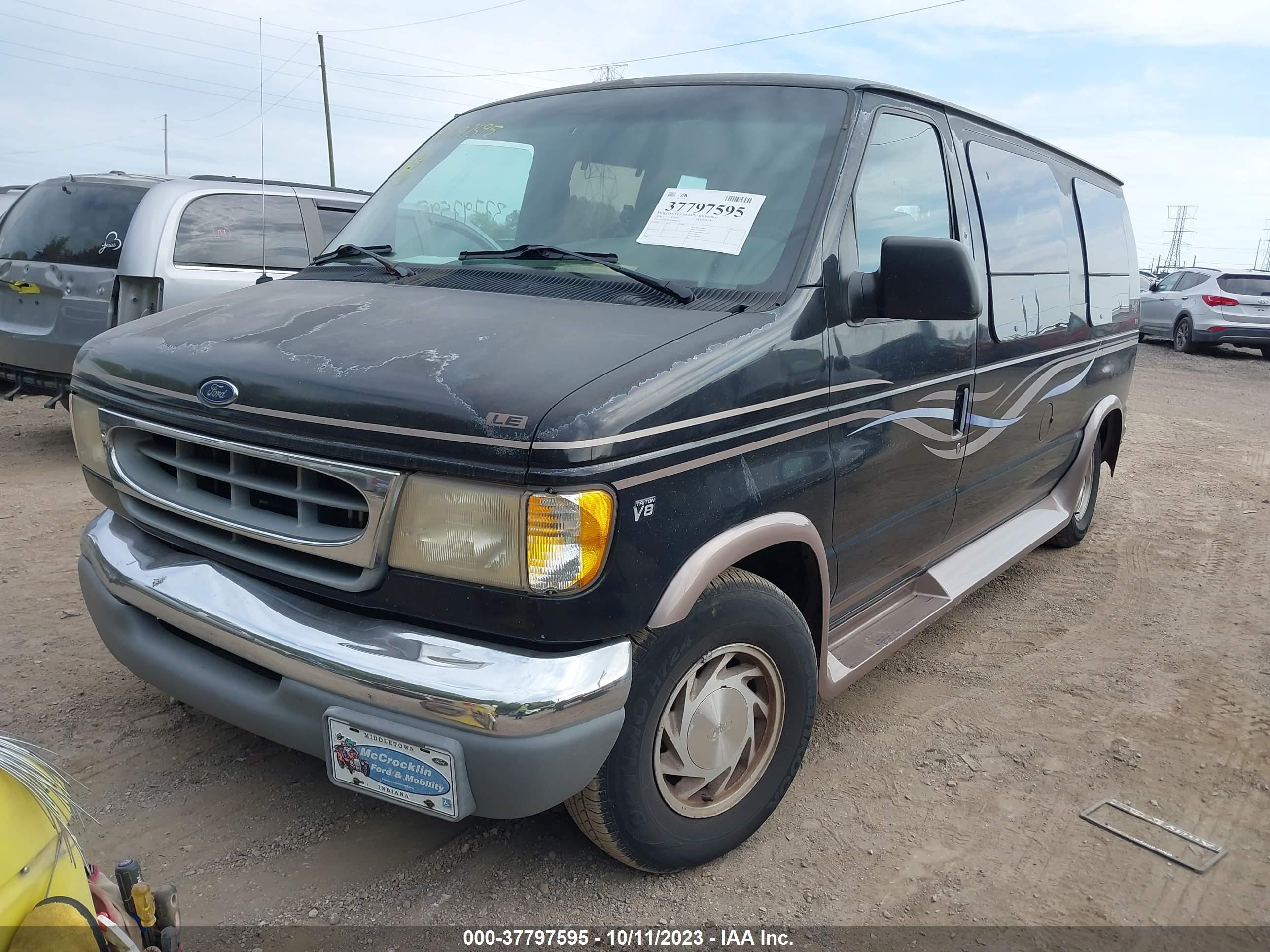 Photo 1 VIN: 1FDRE14L0XHB40642 - FORD ECONOLINE 