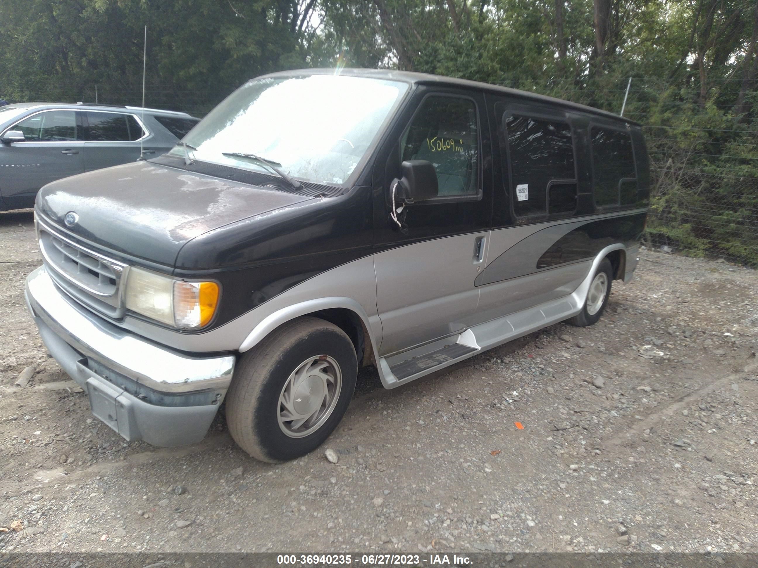 Photo 1 VIN: 1FDRE14L1XHB22697 - FORD ECONOLINE 