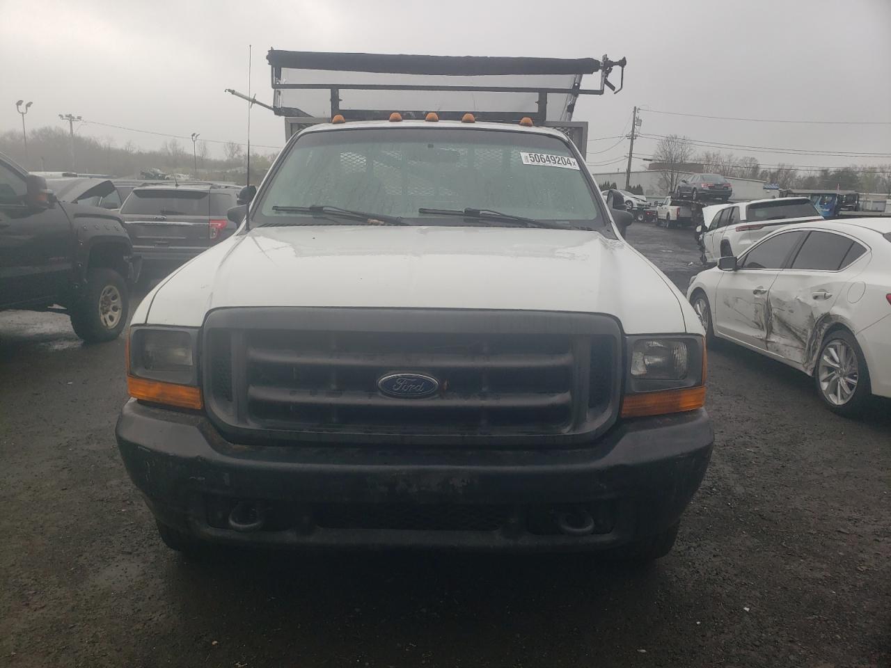 Photo 4 VIN: 1FDSF34L7YEC60354 - FORD F350 