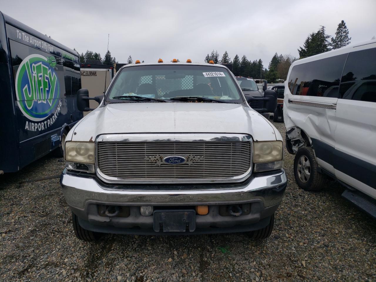 Photo 4 VIN: 1FDXW46S91EA24732 - FORD F450 