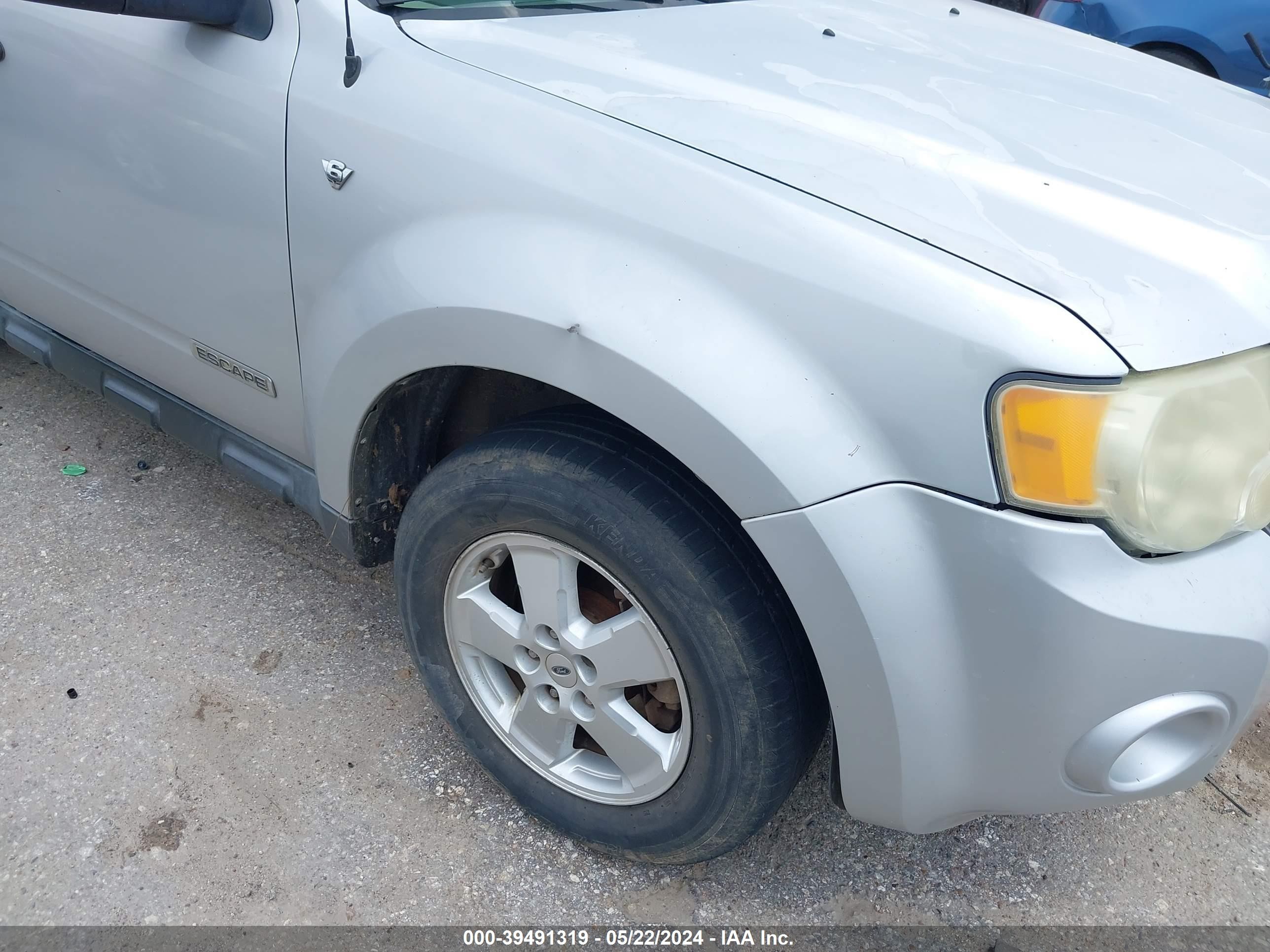 Photo 10 VIN: 1FMCU03128KA50187 - FORD ESCAPE 