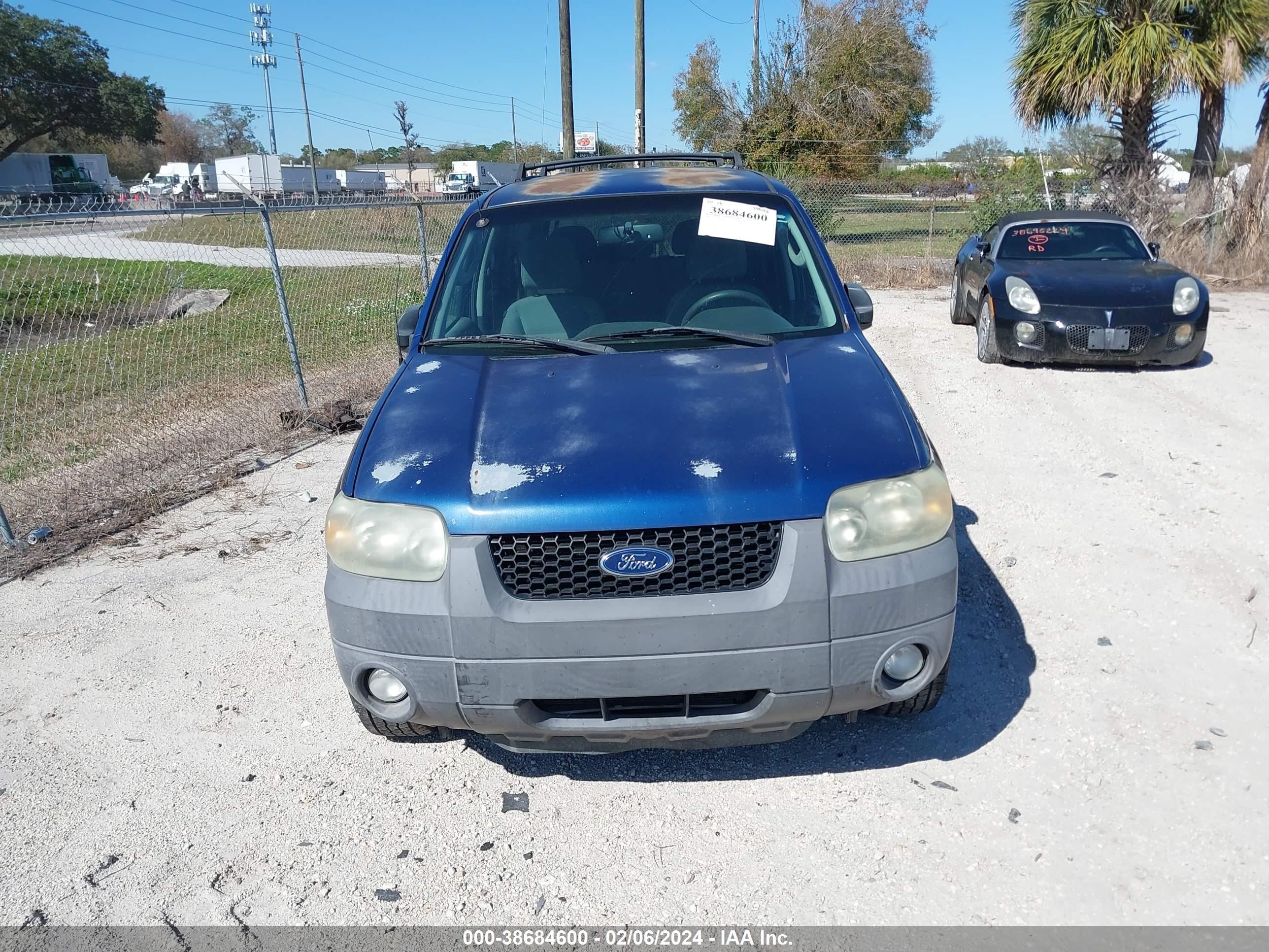 Photo 5 VIN: 1FMCU03157KA64874 - FORD ESCAPE 