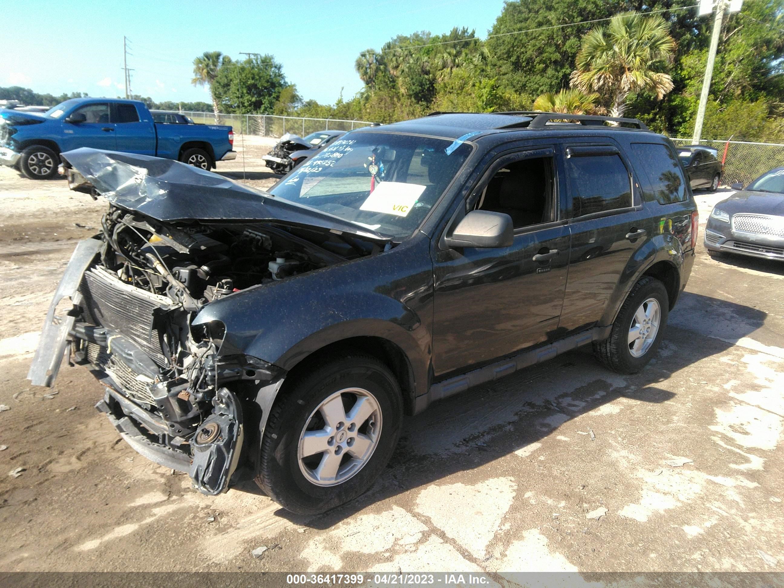 Photo 1 VIN: 1FMCU03GX9KA86800 - FORD ESCAPE 