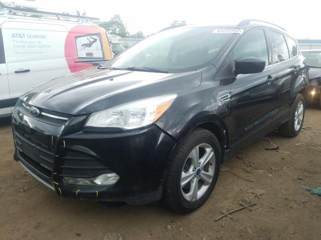 Photo 1 VIN: 1FMCU0G9XEUB30885 - FORD ESCAPE SE 