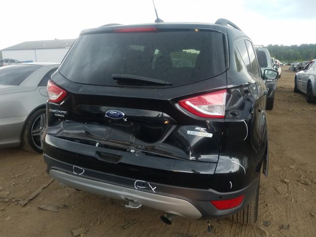 Photo 8 VIN: 1FMCU0G9XEUB30885 - FORD ESCAPE SE 