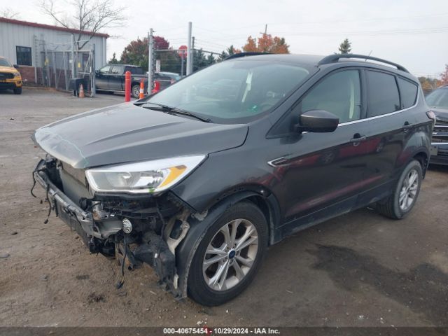 Photo 1 VIN: 1FMCU0GD1JUC49360 - FORD ESCAPE 