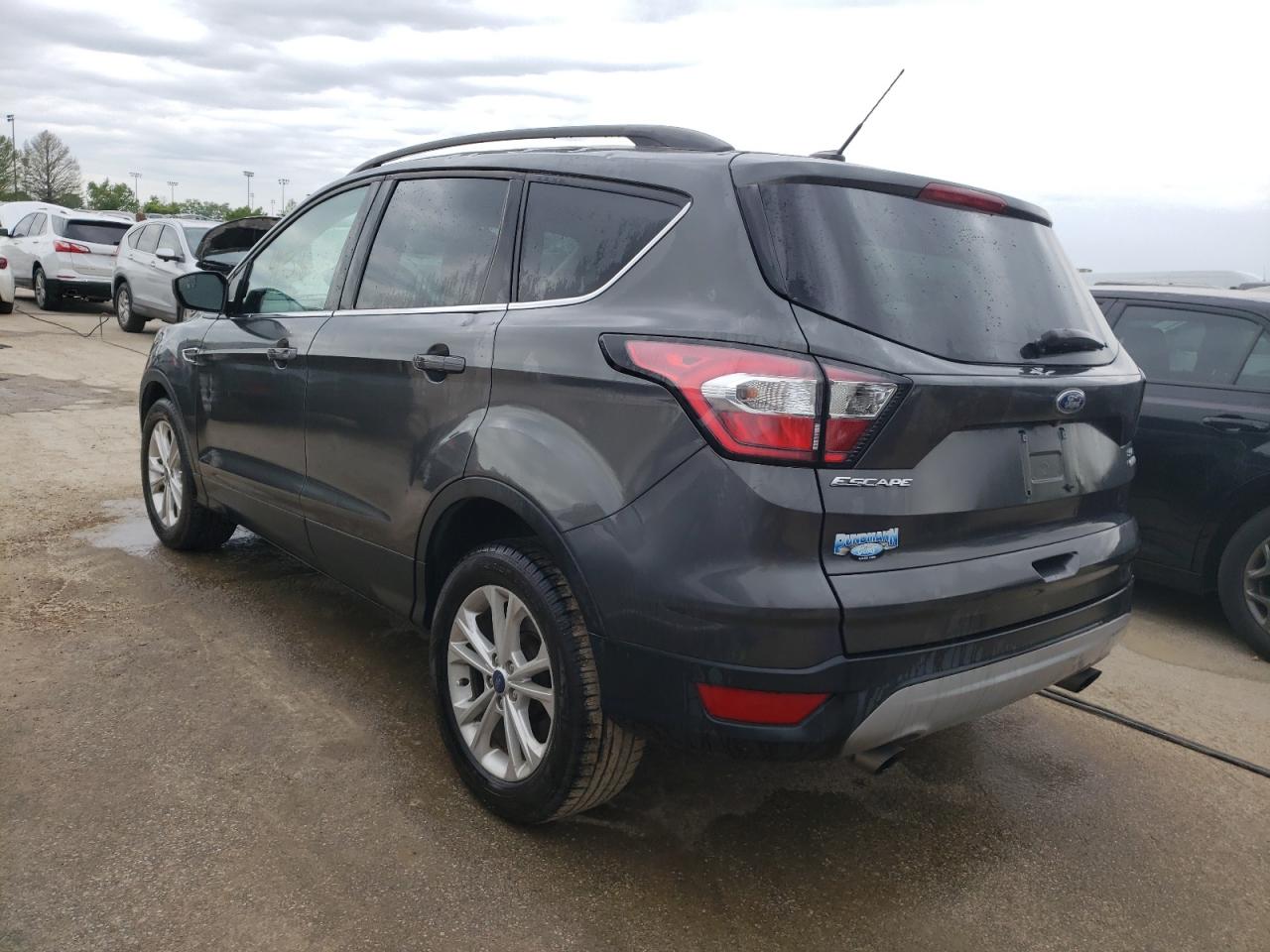 Photo 1 VIN: 1FMCU0GD1JUC74680 - FORD ESCAPE 