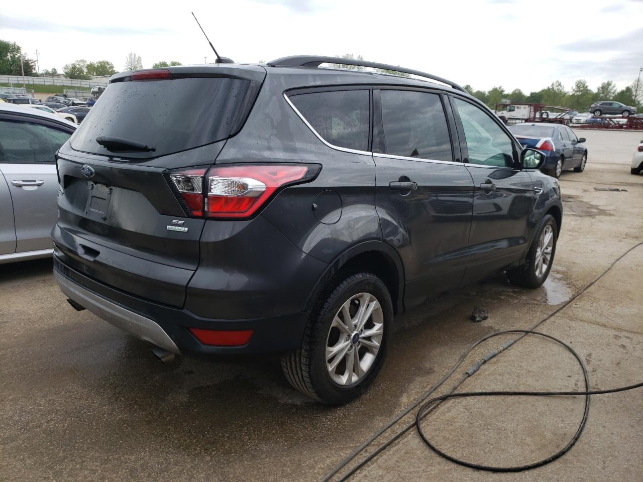 Photo 2 VIN: 1FMCU0GD1JUC74680 - FORD ESCAPE 