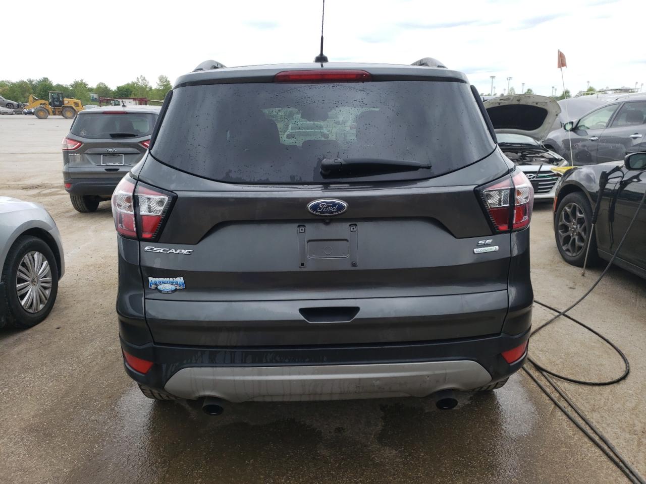 Photo 5 VIN: 1FMCU0GD1JUC74680 - FORD ESCAPE 