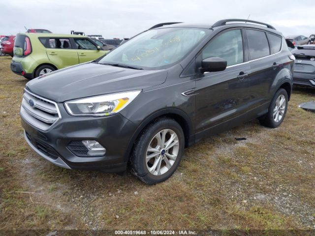 Photo 1 VIN: 1FMCU0GD5JUD26277 - FORD ESCAPE 