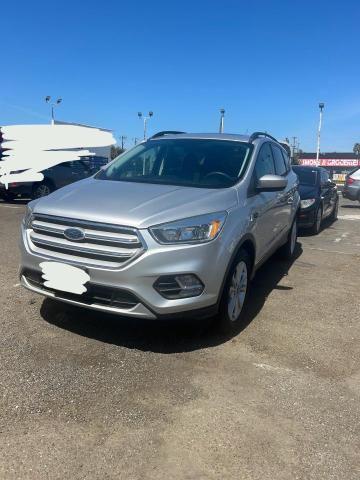 Photo 1 VIN: 1FMCU0GD8JUB15588 - FORD ESCAPE SE 